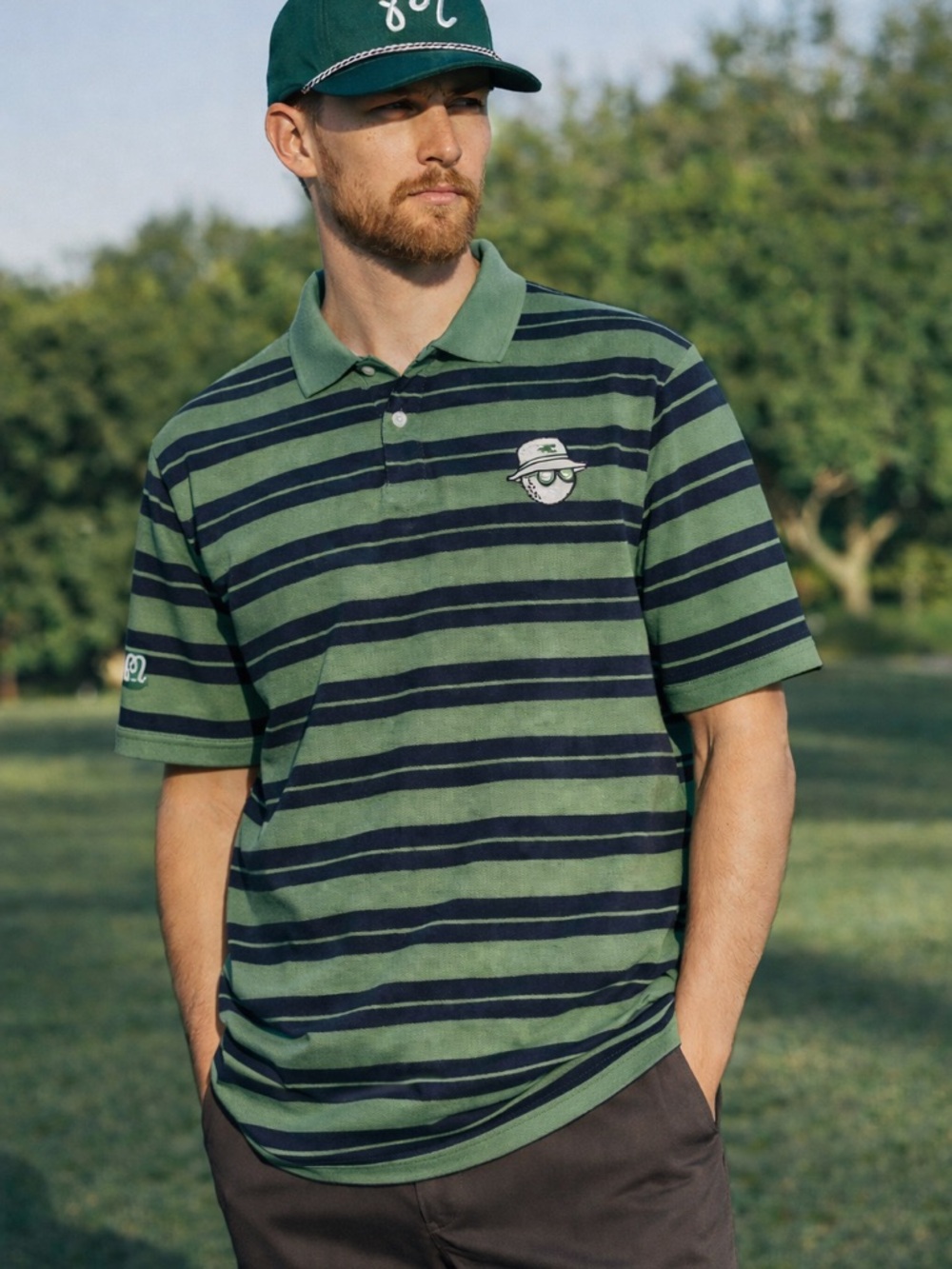 Malbon amongst the cypress green and navy striped golf polo XL